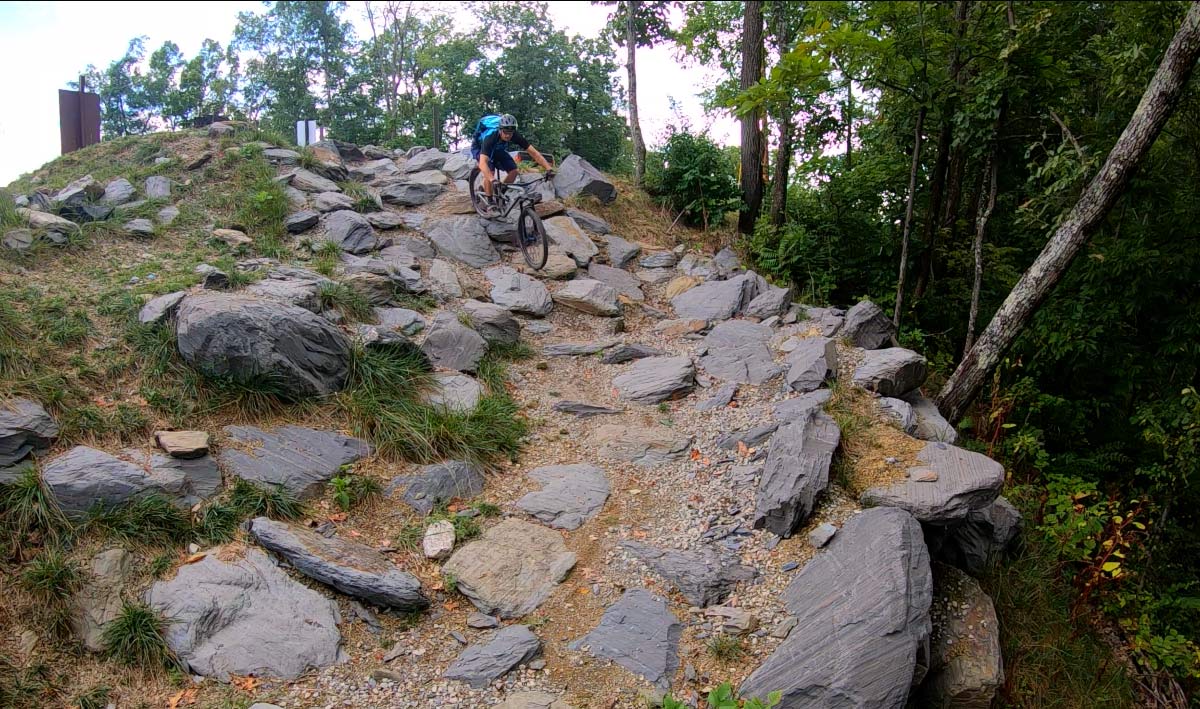 trail review at tannery knobs mountain bike park shows off the rock garden drop in on their black diamond trails