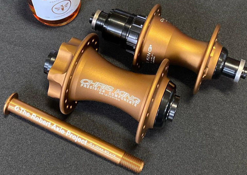 Chris King x The Robert Axle Project Limited Edition thru axles beautifully match CK parts
