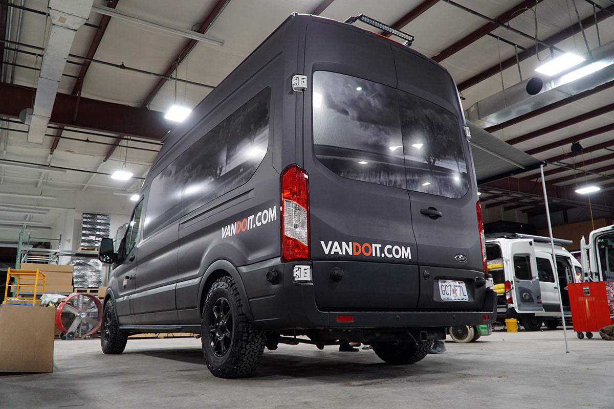 VanDOit factory tour shows how they convert ford transit passenger vans into custom camper vans