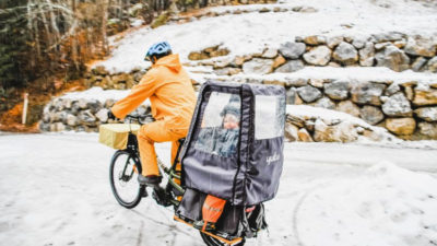 Yuba adds 30″ wide cable actuated dual kickstand, Pop Top cover & $999 cargo bike