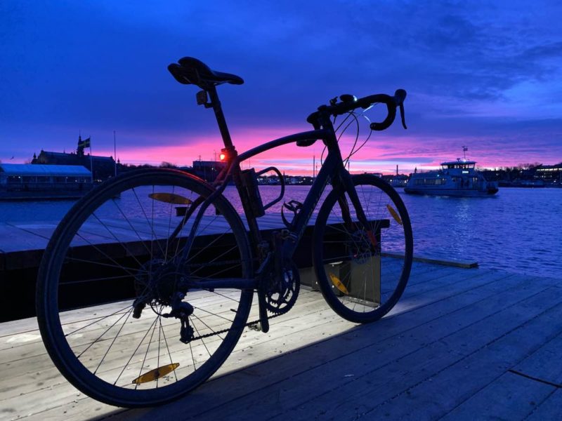bikerumor pic of the day specialized diverge bicycle on a pier at sunrise with dark blue skies and purple peeking out over the horizon.