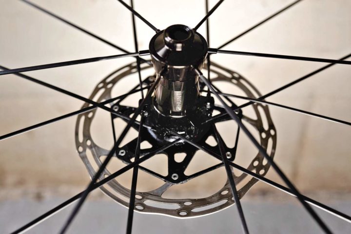 Featured image for the article Hunt UD Carbon Spoke Disc road wheels spin up ultralight & aero, super stiff & serviceable, lifetime all-road performance