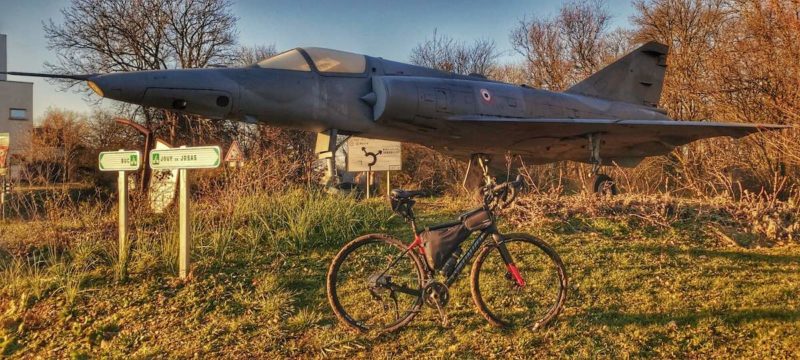 bikerumor pic of the day specialized diverge sitting in front of a mirage 3-r outside of buc france.