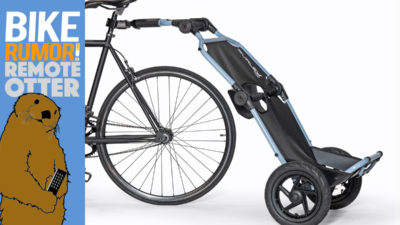 Burley loads up folding Travoy bicycle cargo trailer, adaptable Dash child seats [Remote Otter]