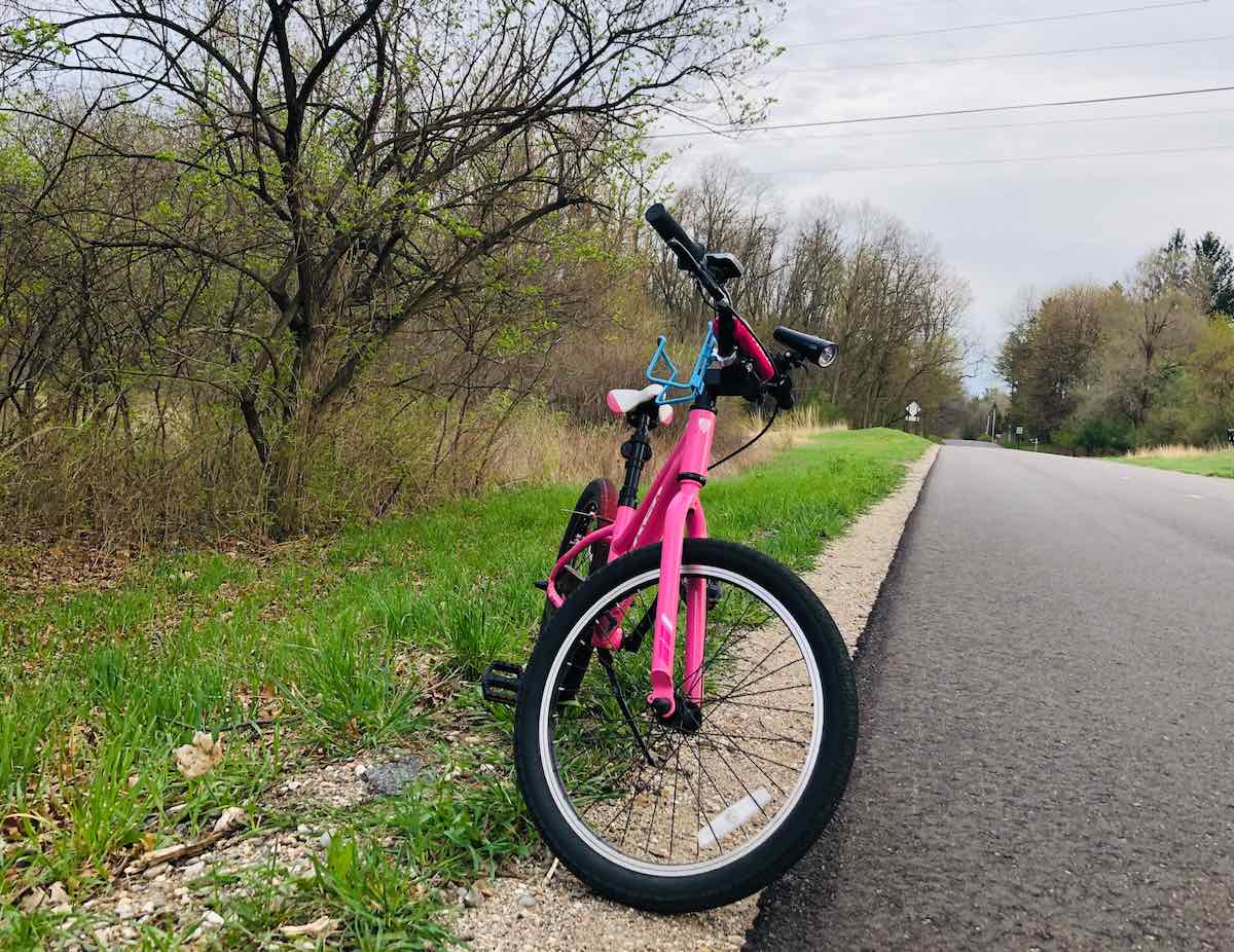 bikerumor pic of the day kids pink bike on the side of the road in williamston michigan.