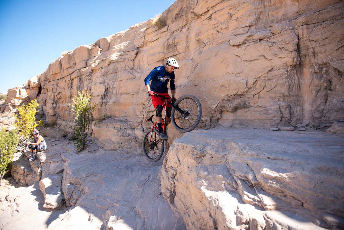 ambassador-Jeff-Lenosky-nailing-a-technical-climb-rear-tire-traction-steep-terrain-rocks