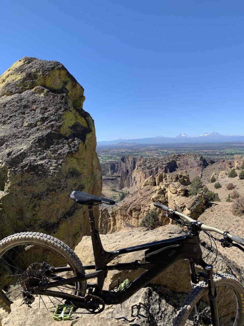 bikerumor pic of the day smith rock state park oregon rocky mountain overlooking snow capped mountains in the distance