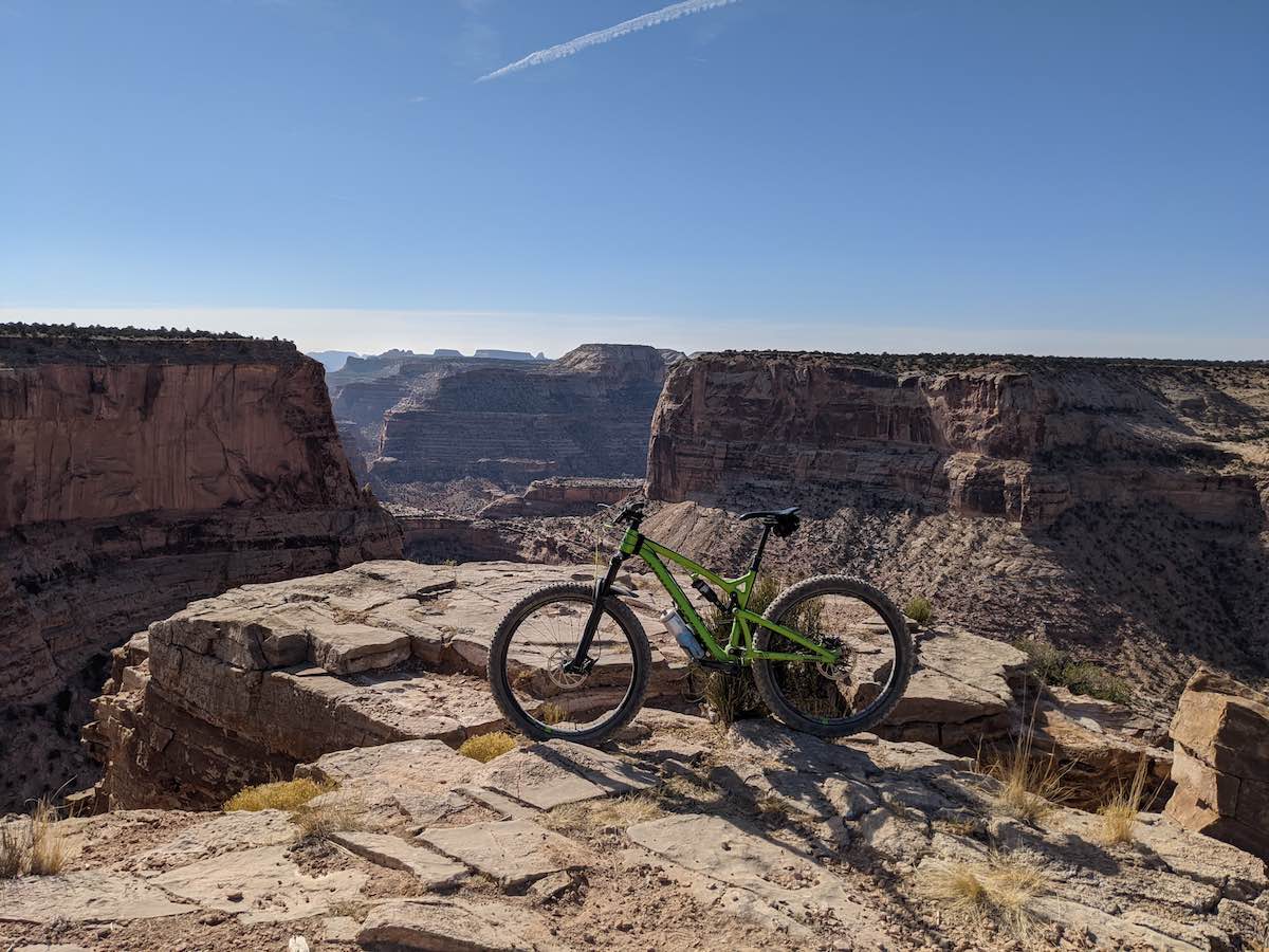 bikerumor pic of the day bicycle on the edge of a canyon along the good water canyon in utah.