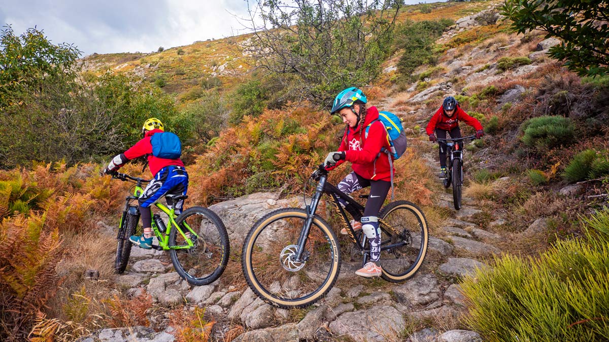 Urge Nimbus kids MTB helmet, affordable child-sized eco-friendly all-trail all-mountain bike head protection, La Montagne du Caroux rock garden