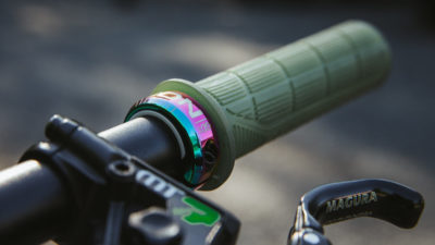 Ergon slides colorful new Oil Slick lock ring onto your grips