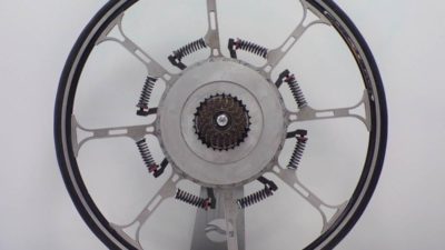Super Wheel springs to life w/weight to energy conversion, possible e-bike alternative