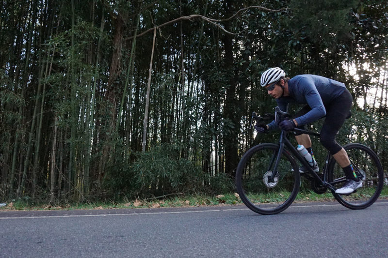2021 specialized aethos pro lightweight road bike review and action riding photo