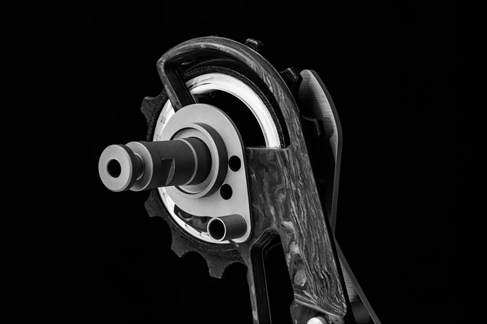 titan carbon fiber rear derailleur pulley cage with oversize pulley bearings