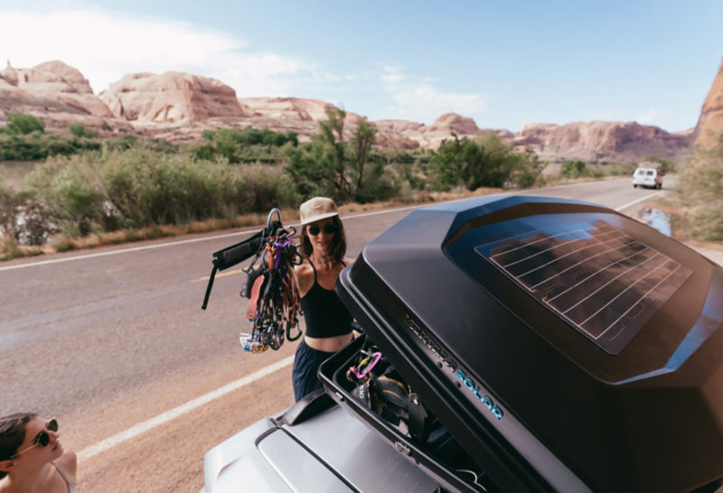 yakima CBX solar rooftop cargo box with solar panel mounted to vehicle