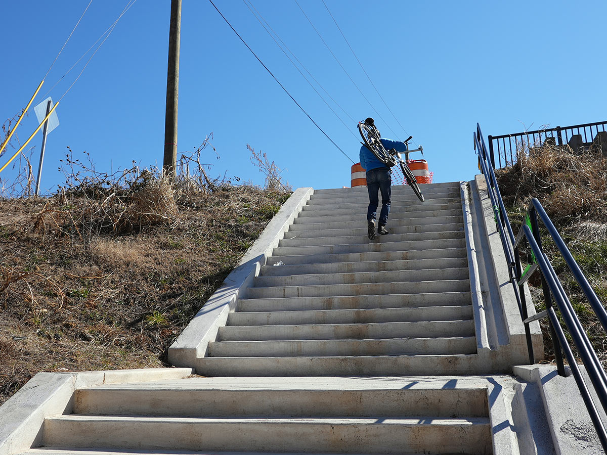 walking the specialized turbo vado sl up a staircase