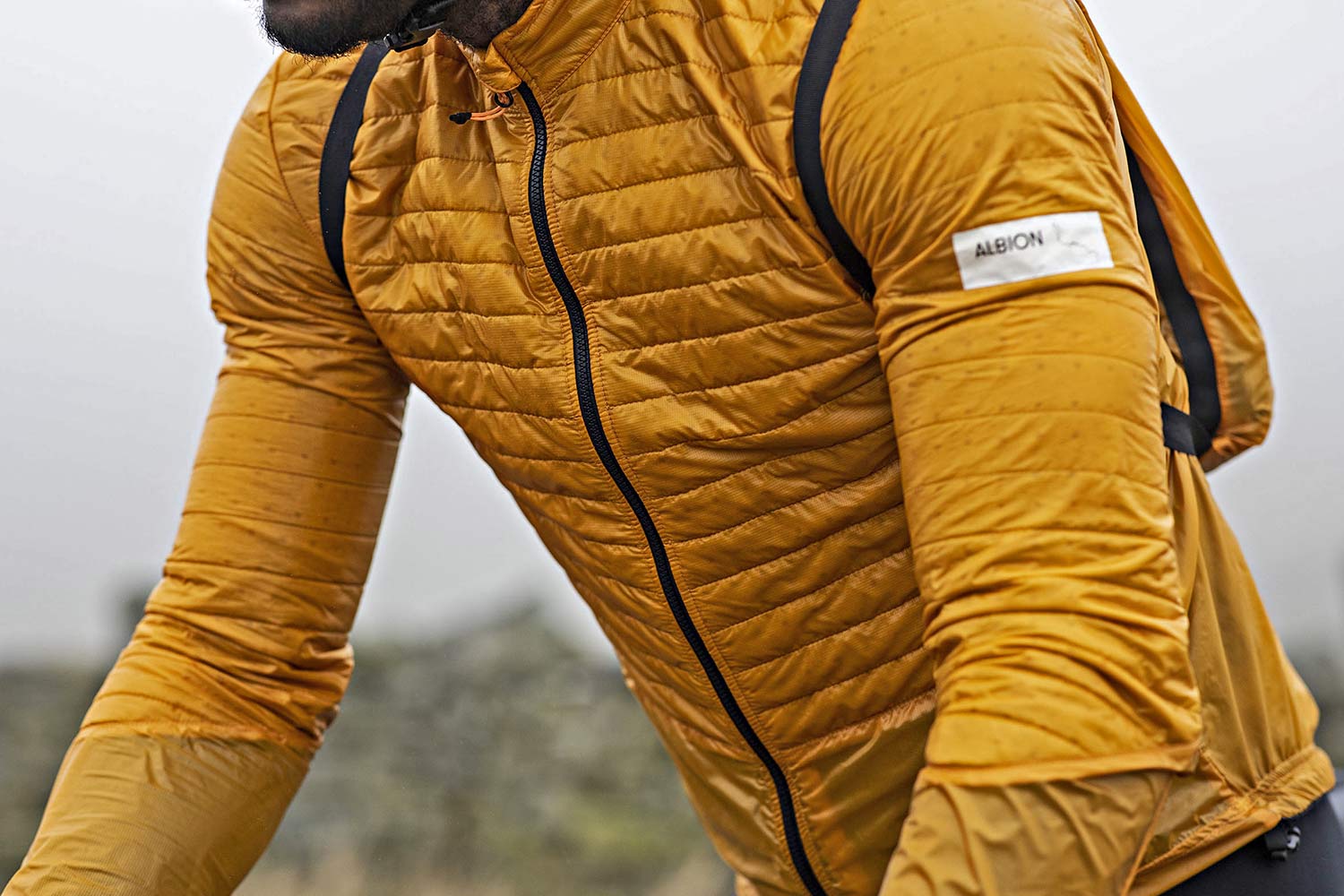 Albion Ultralight Insulated Jacket, ultra lightweight packable breathable eco cycling jacket and backpack, detail up close