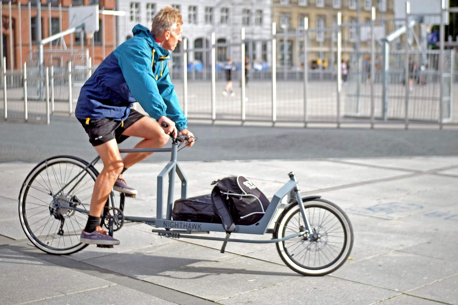KP Cyclery Nighthawk steel cargo bike, affordable EU-made customizable long john cargo bikes, riding