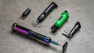 OneUp Components Threadless Carrier stows 20 function EDC V2 Multitool in your steerer