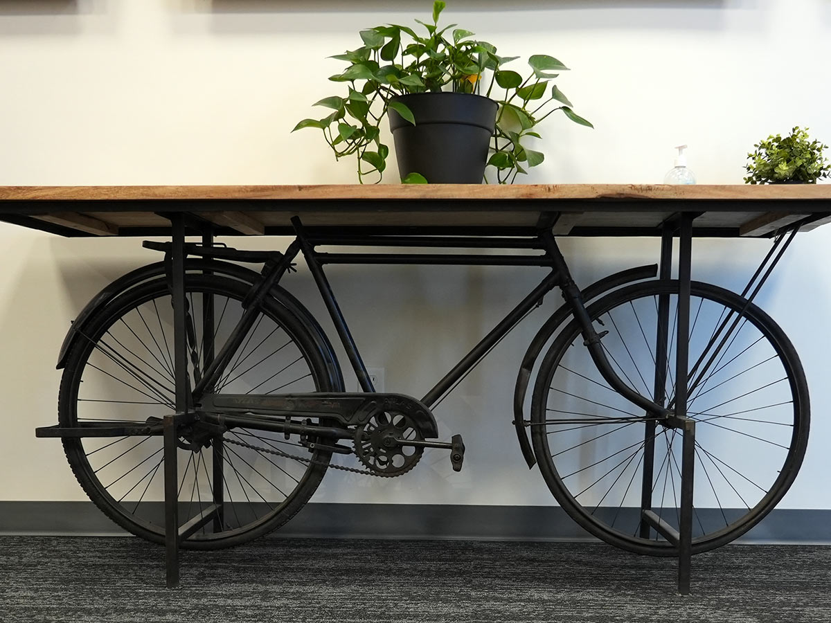 table with a classic bicycle as legs