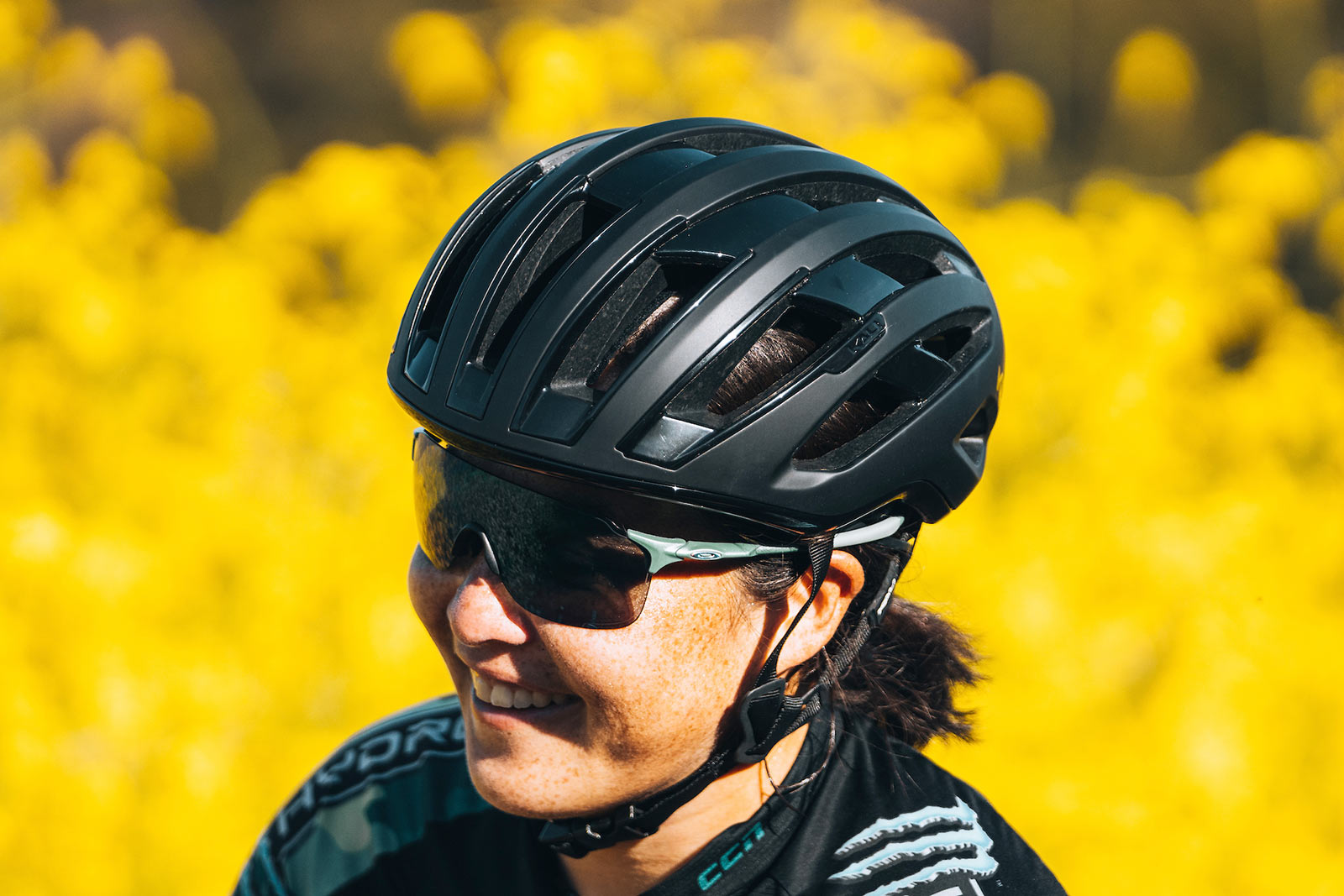 kali grit road and gravel bike helmet on a woman