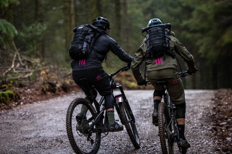 Muc-Off technical apparel, two riders