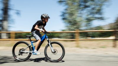woom powers UP e-bikes for kids with Fazua Evation equipped UP5 & UP6 e-MTBs