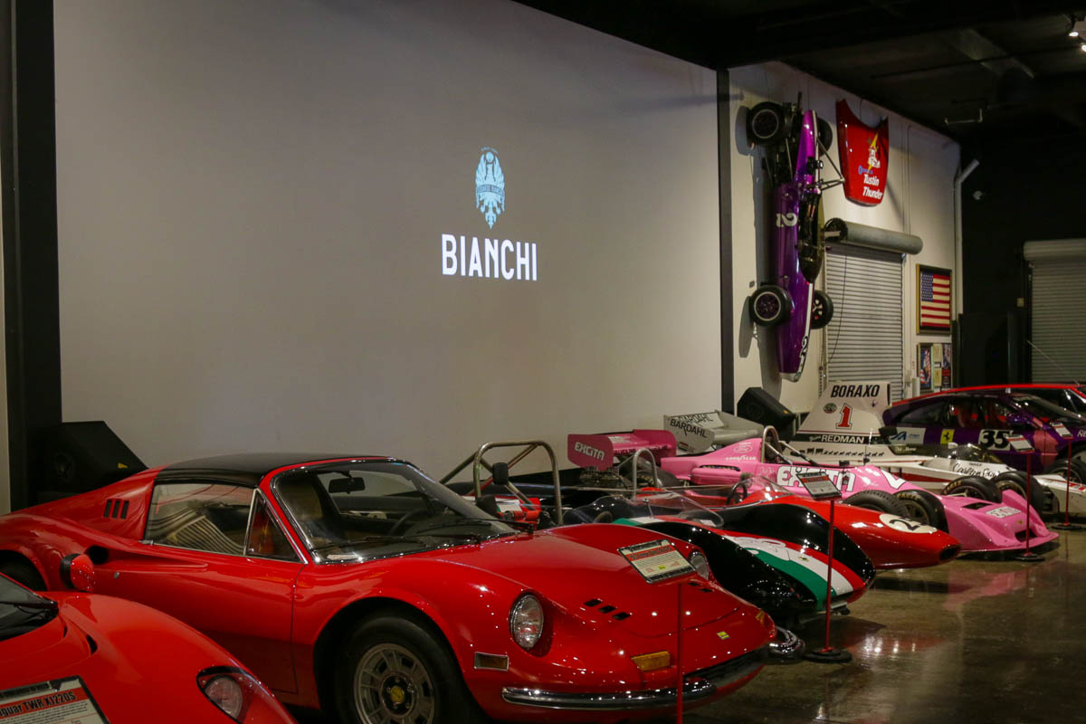 Bianchi behind sports cars and race cars