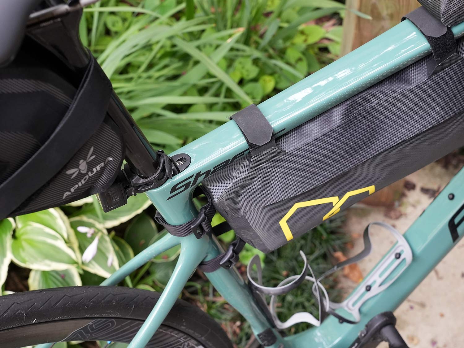 apidura expedition frame pack on a bike