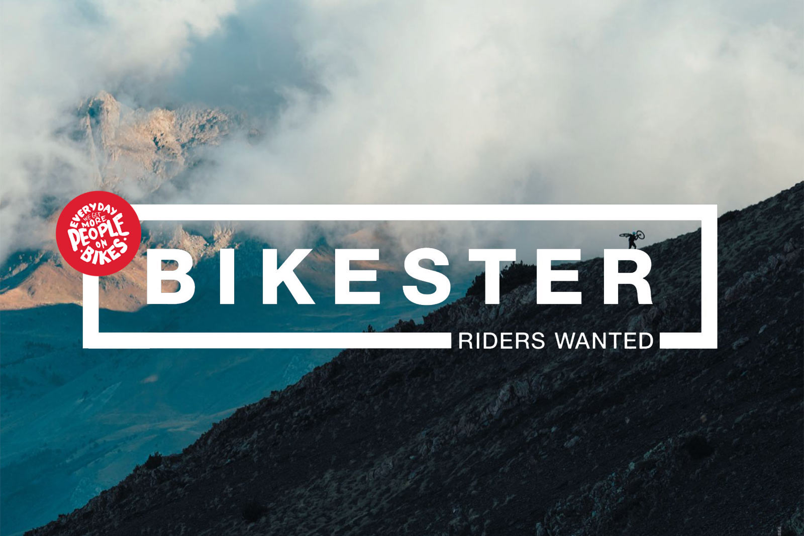 bikester company profile logo over rider on a mountain
