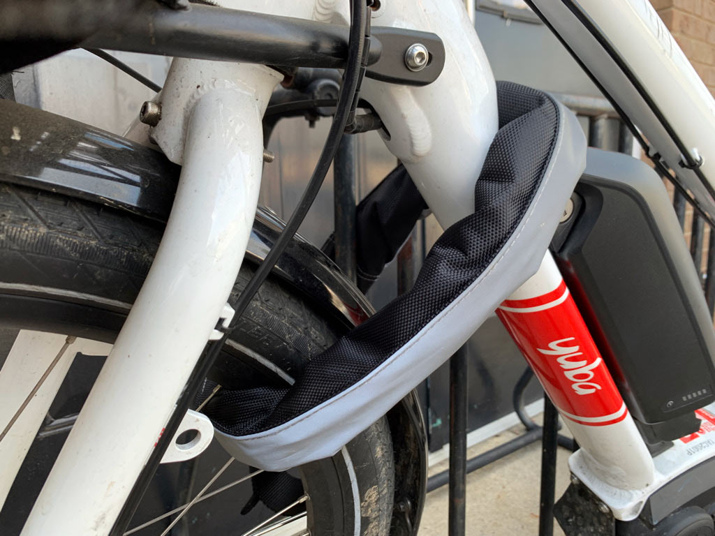 hiplok chain bike lock around a bicycle and wheel