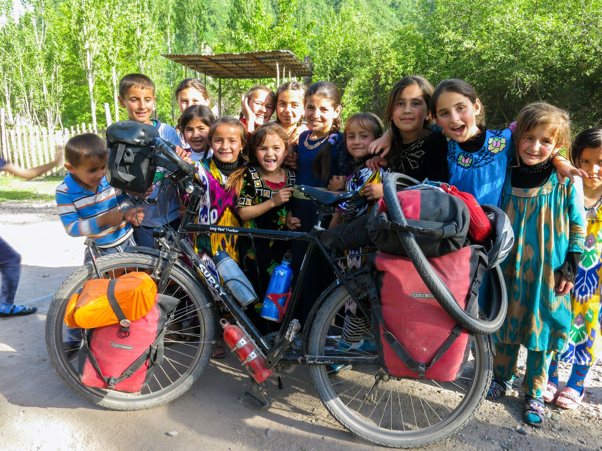 50 ways to cycle the world: children with touring bike