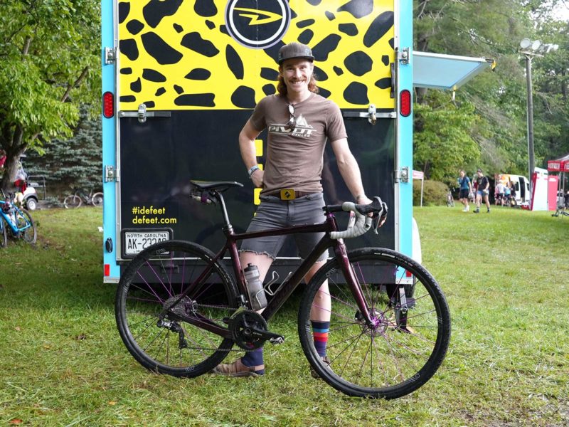 gordon wadsworth pro gravel cyclist showing off his pivot vault race bike