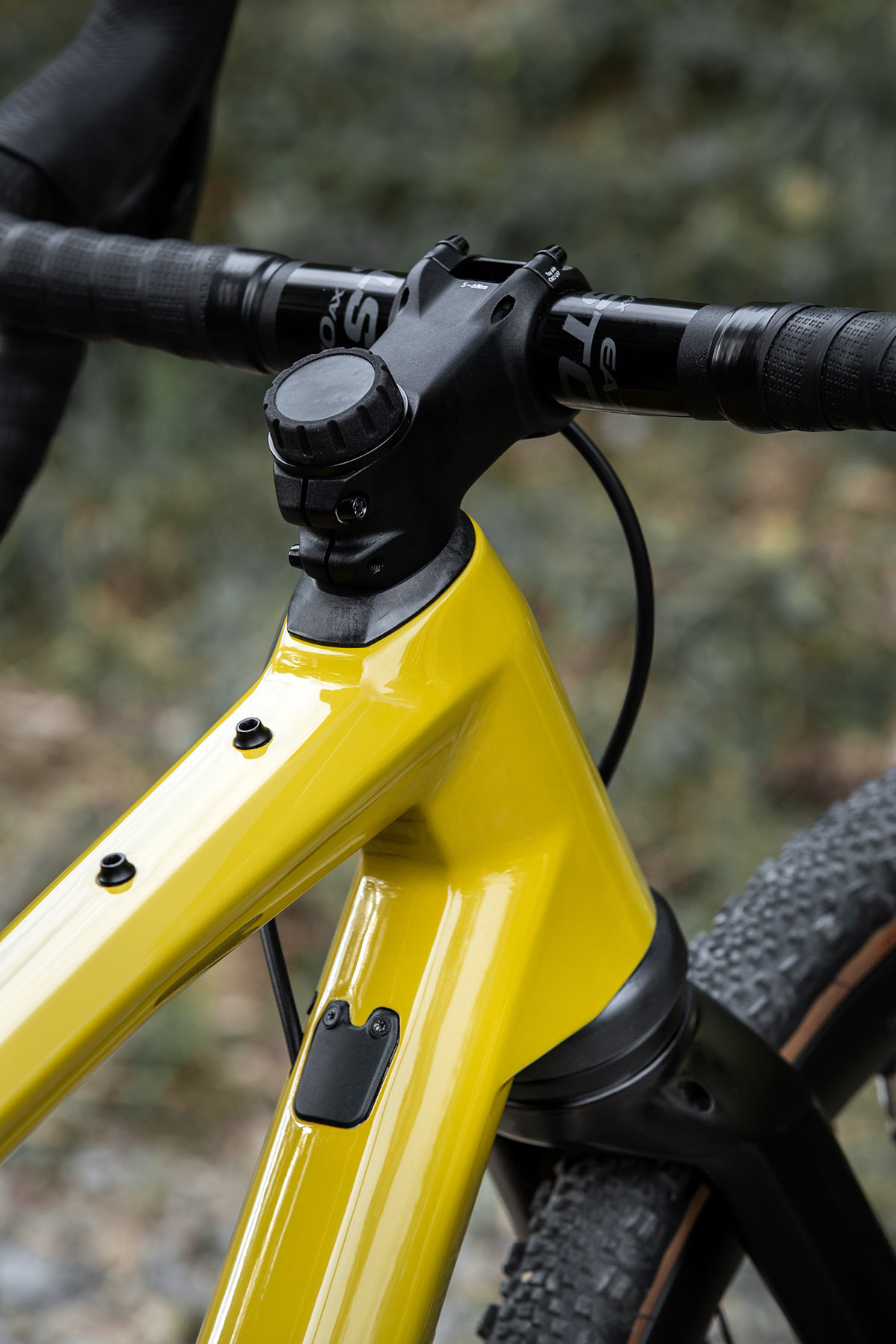 bmc urs lt full suspension gravel bike closeup on fork lockout and top tube mounts