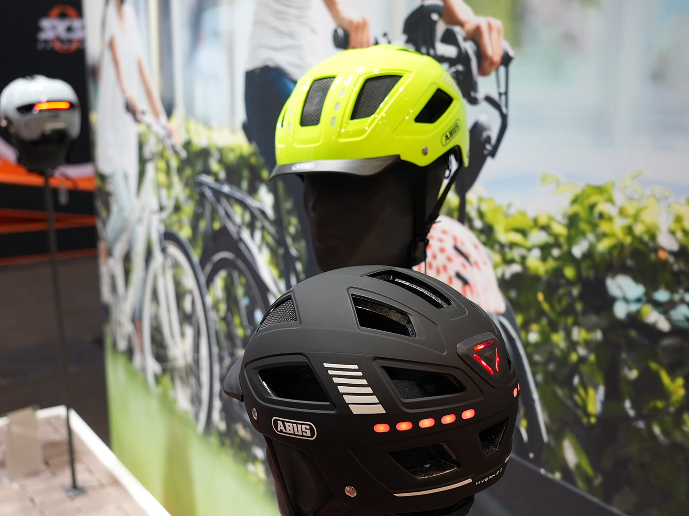 abus hyban 2 LED commuter bike helmet with integrated front and rear lights