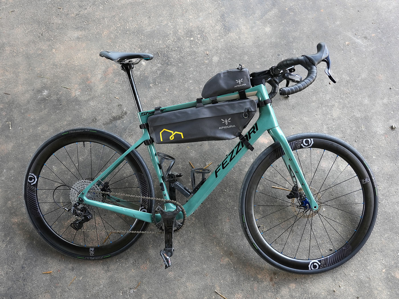 fezzari shafer gravel bike with road wheels and frame bags