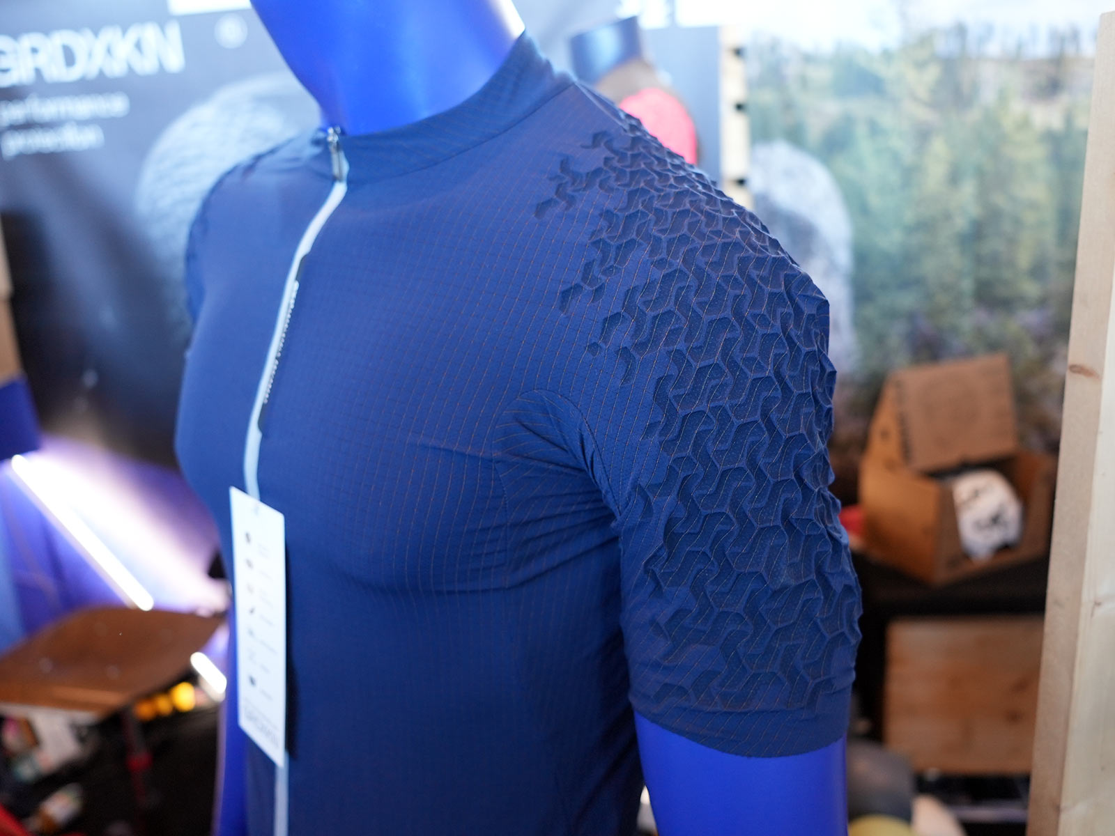 GRDXKN 3D printed protective panels on cycling clothing