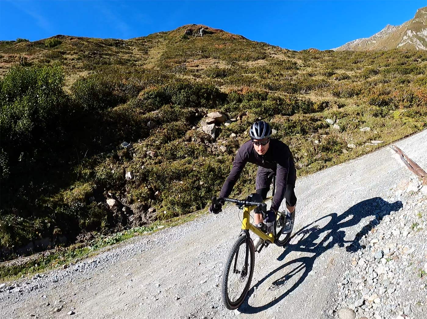 bmc urs lt full suspension gravel bike review ride down a mountain pass in switzerland