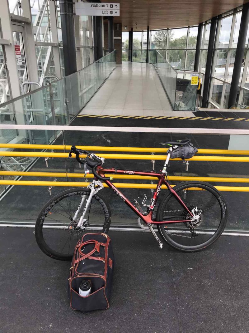 bikerumor pic of the day a bicycle is inside a train station next to a bag packed for a weekend in worcester parkway uk
