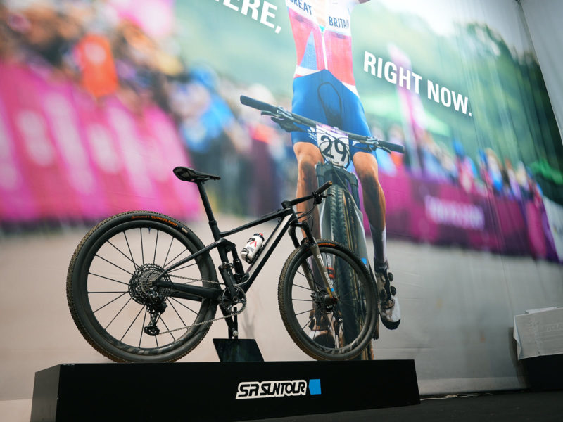 tom pidcock's olympic gold medal winning xc mountain bike with prototype SR Suntour electronic suspension shown at eurobike 2021