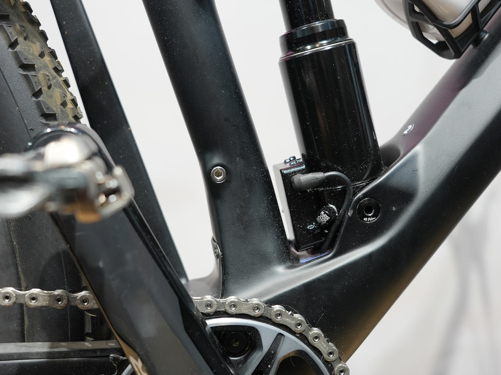closeup of prototype electronically controlled suspension on tom pidcock's olympic mountain bike