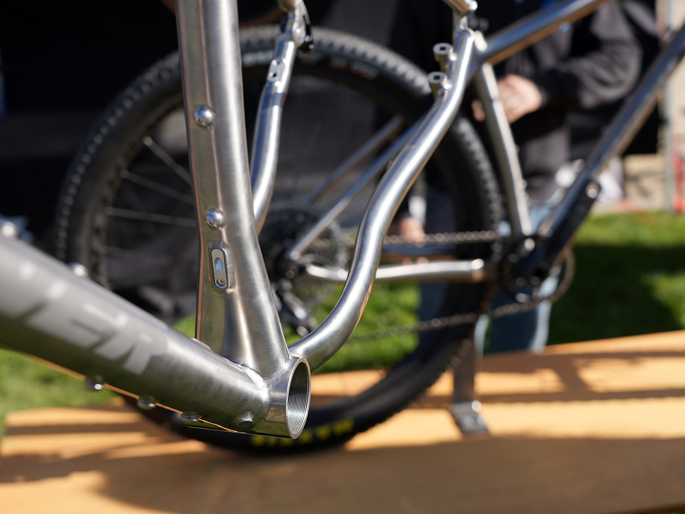 seat tube and bottom bracket junction closeup on 2022 turner cyclosys titanium gravel bike
