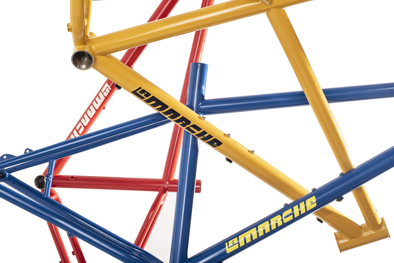 a collection of bike frames of different colors against a white background
