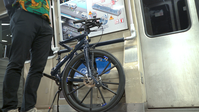 Tuck Bike folding bike on train