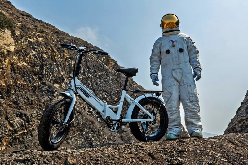SMART METL airless no-flat bicycle tire prototype with rubber tread, astronaut