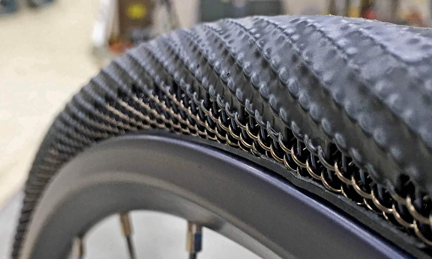 SMART METL airless no-flat bicycle tire prototype with rubber tread, early detail