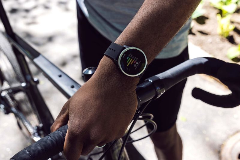 cyclist wearing suunto 5 peak GPS sports watch