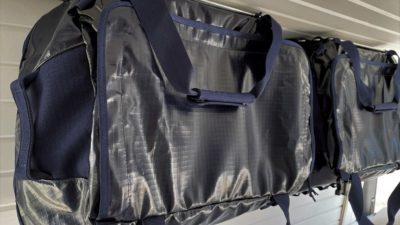 Aspen Frontiers duffel rack turns Patagonia bags into hanging cabinets for van life
