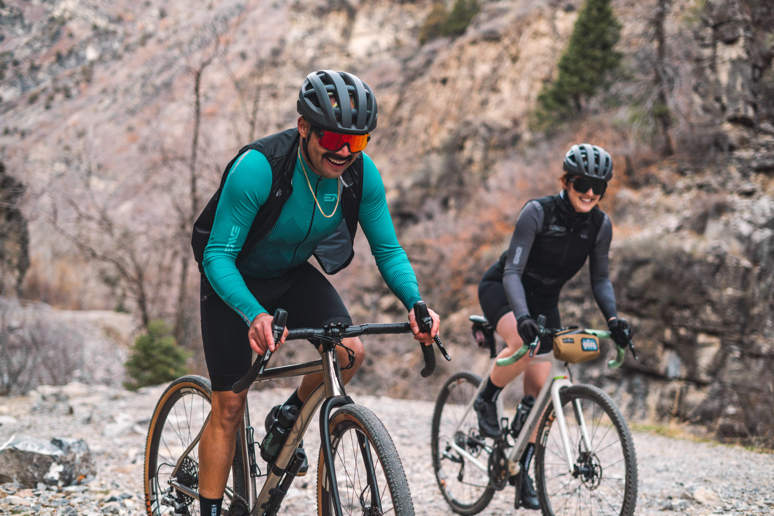 Two cyclists wearing ENVE's new Horizon Collection.