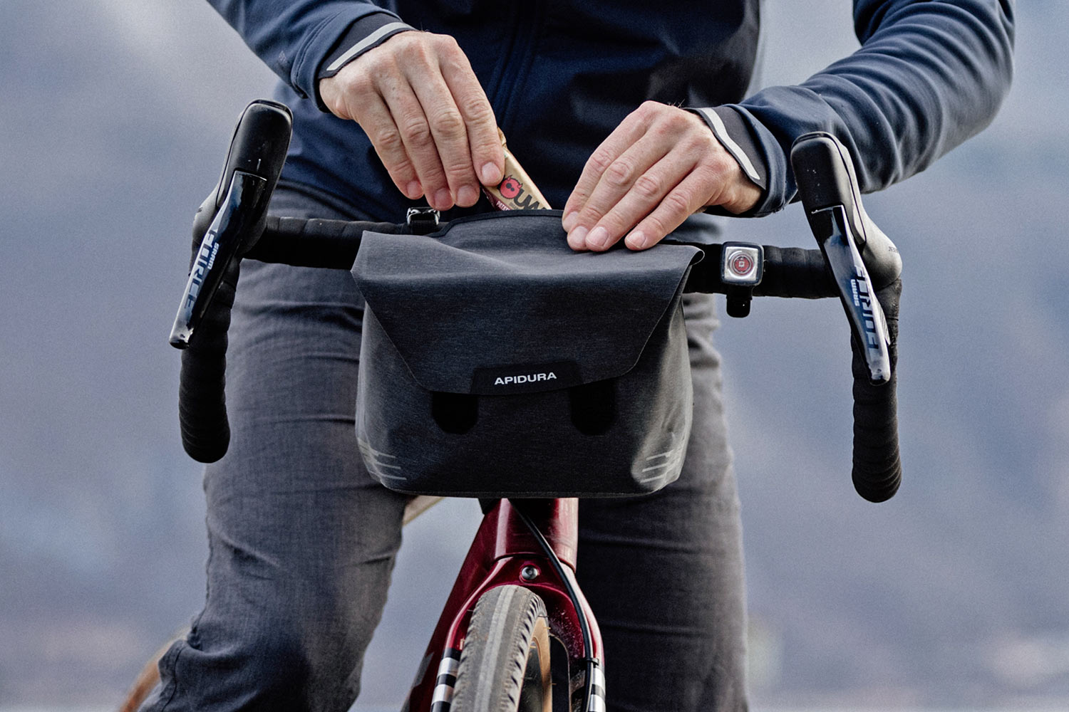 Apidura City Handlebar Pack, quick-release 2L gravel bike commuter bar bag, on-bike snakcs