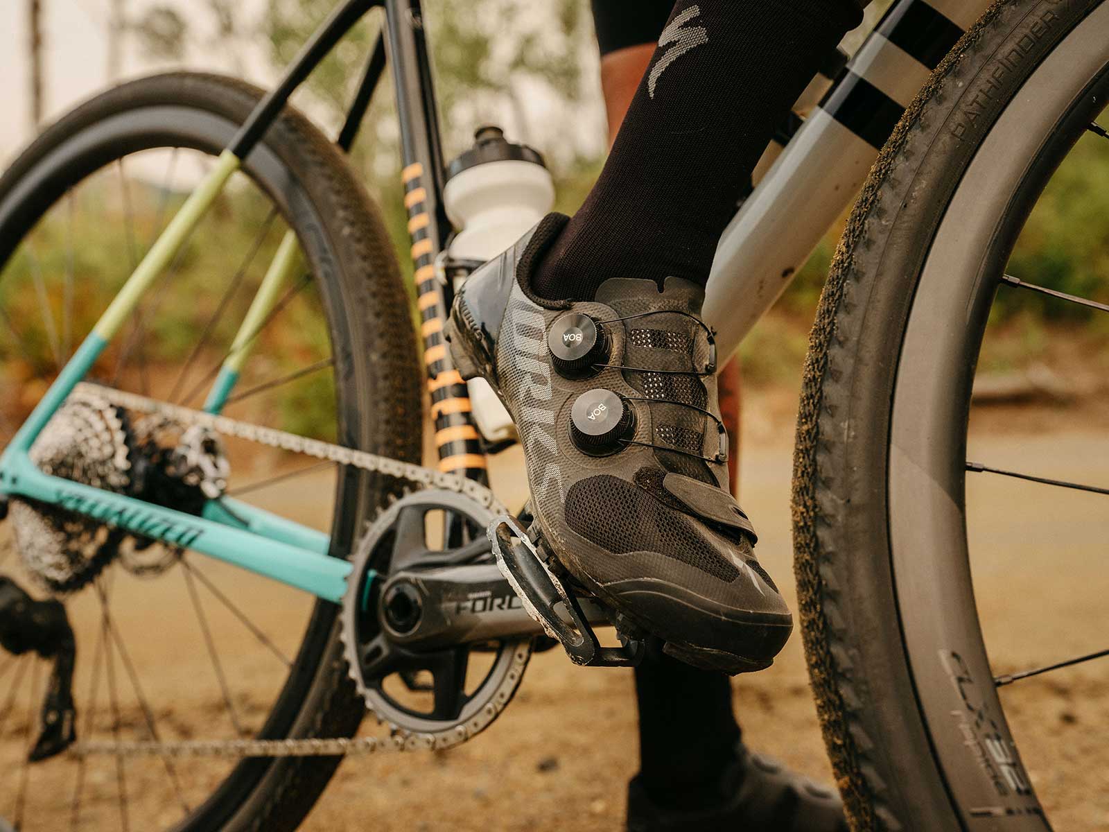 new specialized s-works vent evo gravel bike shoes shown on a rider